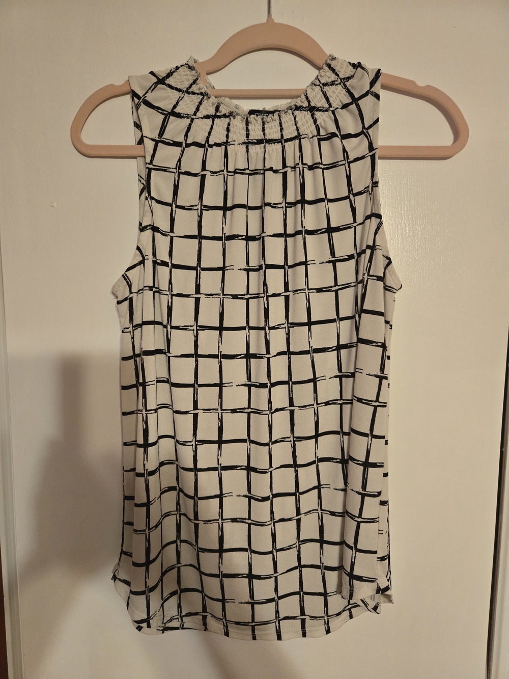 Sleeveless White Top with Black Grid Print